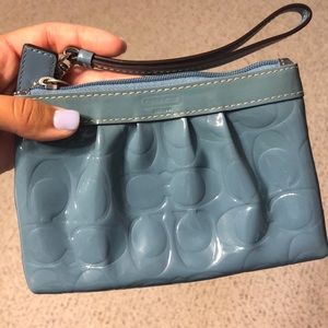 Blue coach wristlet, small size